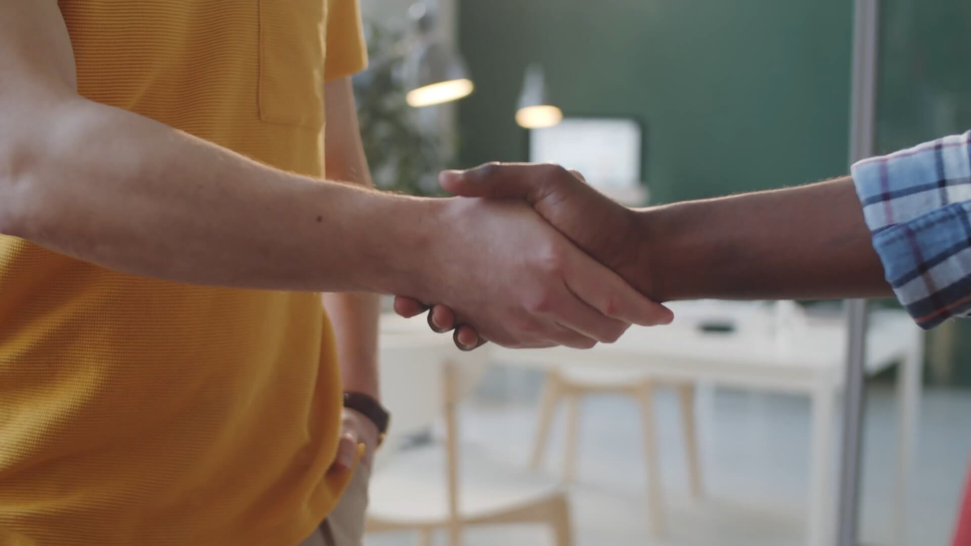 Handshake with Coworker in Office