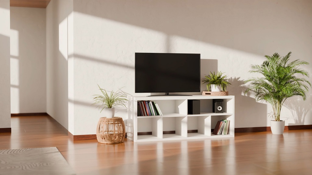 Bright small living room with natural sunlight, light walls, minimal furniture, and open floor space creating an airy feel